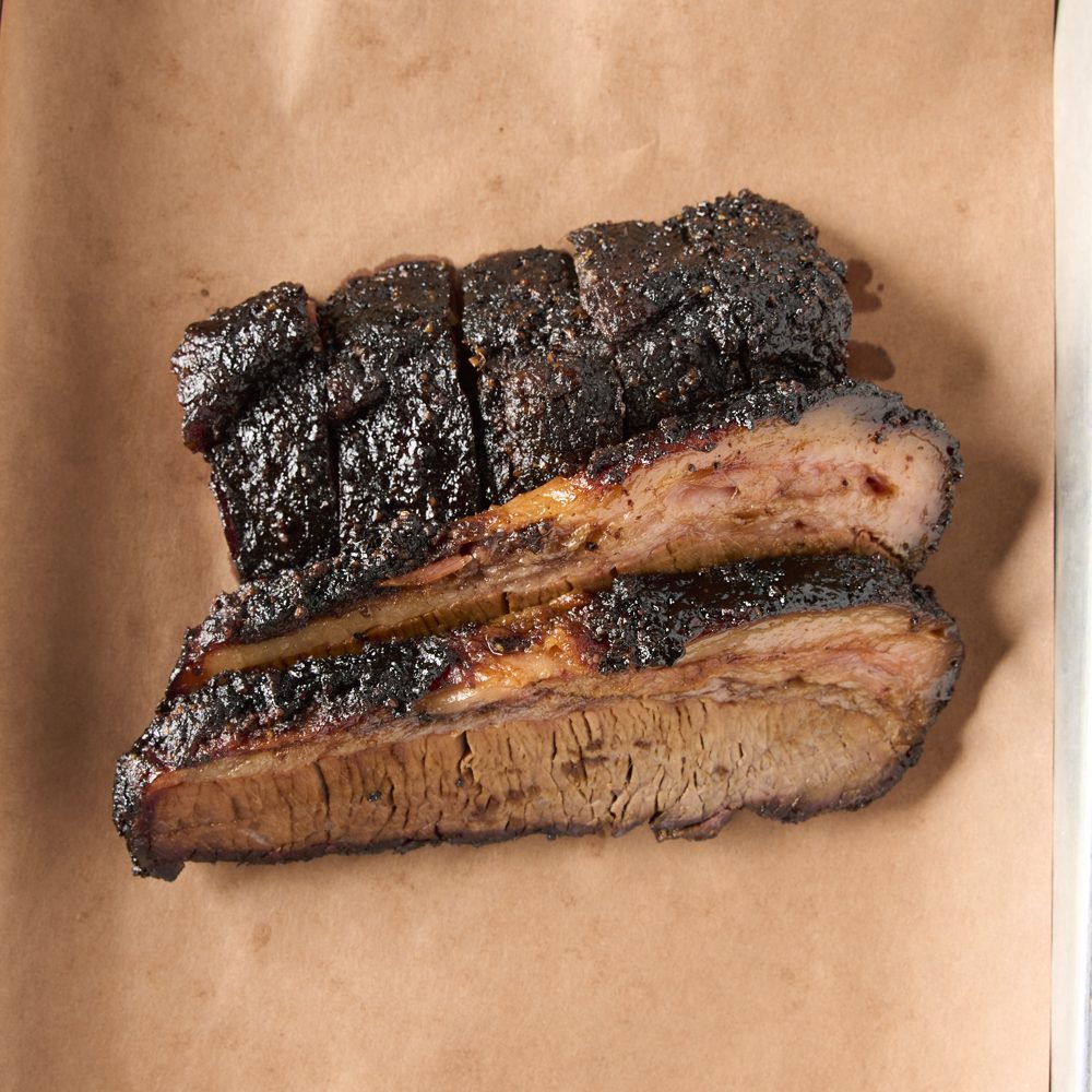 A pound of sliced brisket from above on butcher paper
