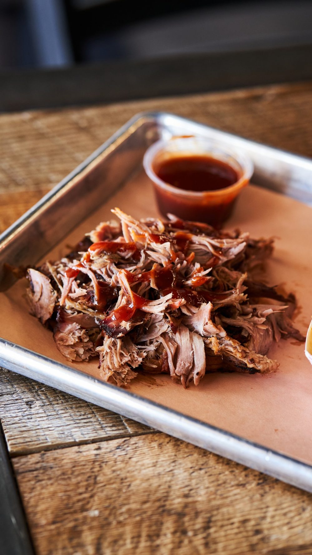 Pulled pork with BBQ sauce on a tray