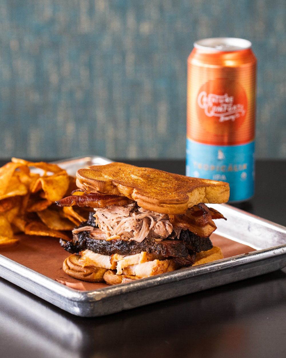 The Soul Saver: pulled pork, brisket, chicken and bacon on Texas toast with house chips