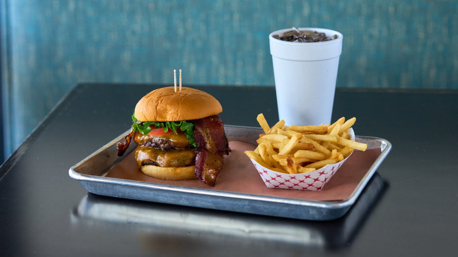 Double burger with bacon and fries